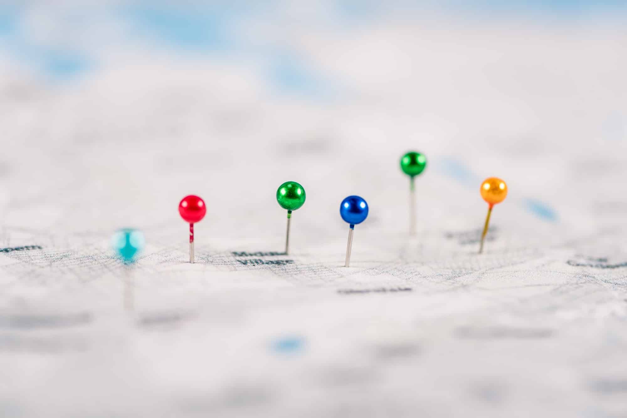 close-up shot of colorful pins on map